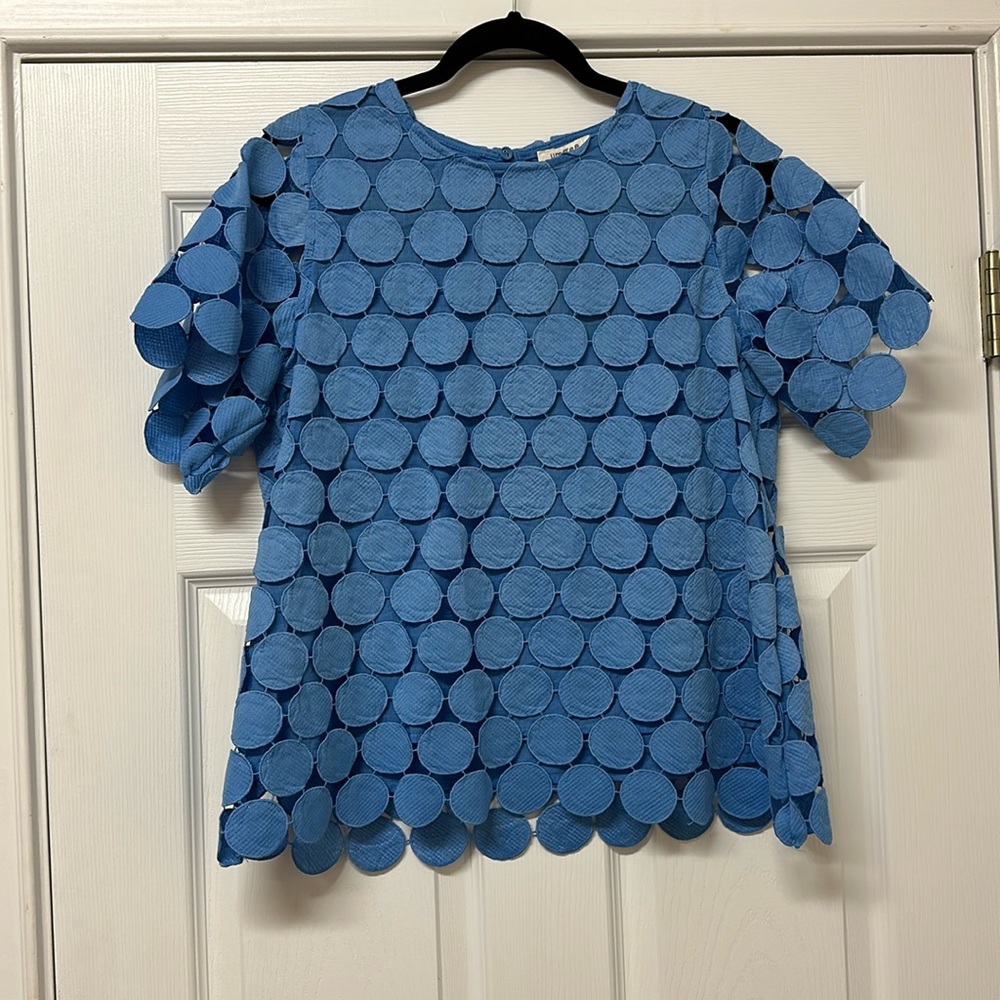 NWT layered top. Unlined short sleeves. Slight A line shape.